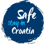 Blue circular logo with the text "Safe stay in Croatia" in white and light blue, ideal for those enjoying private boat tours and day trips in Dubrovnik.