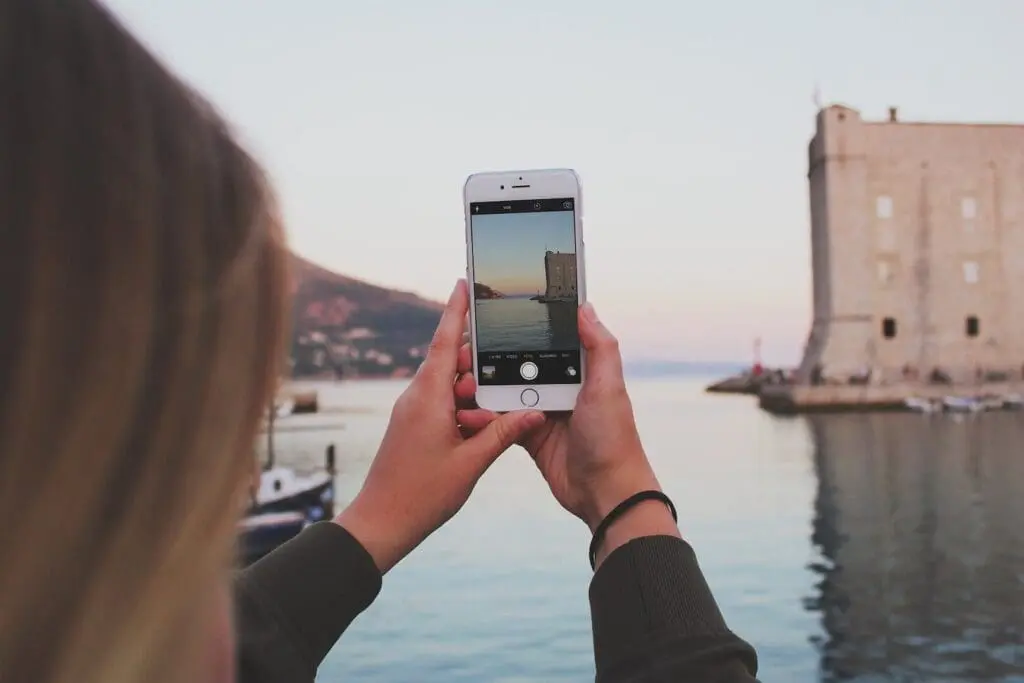 dubrovnik woman taking photo on phone