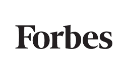 Logo of Forbes with the word "Forbes" in bold, black serif font on a white background.